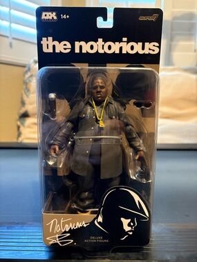 Notorious B.I.G. with the new 7” scale, articulated Deluxe action figure Super7